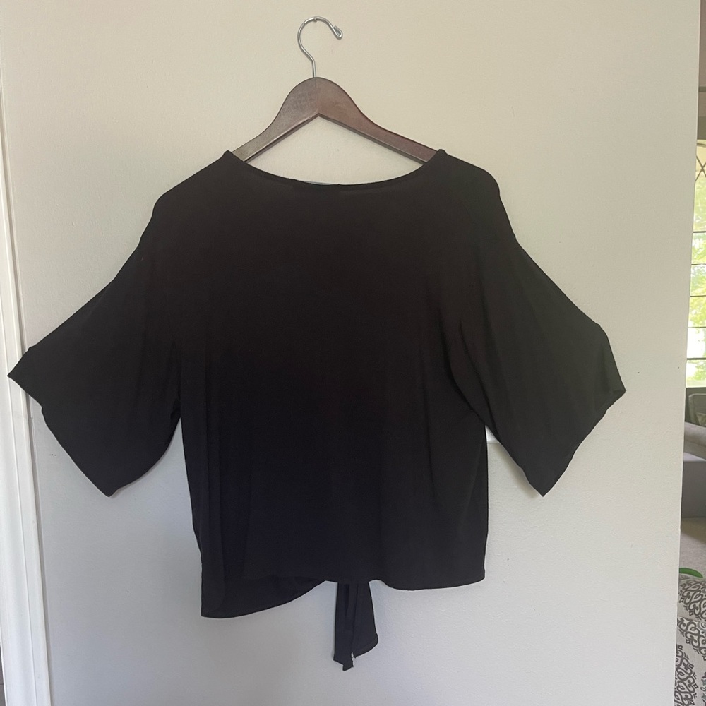 Black cotton knit top with knot at waste
